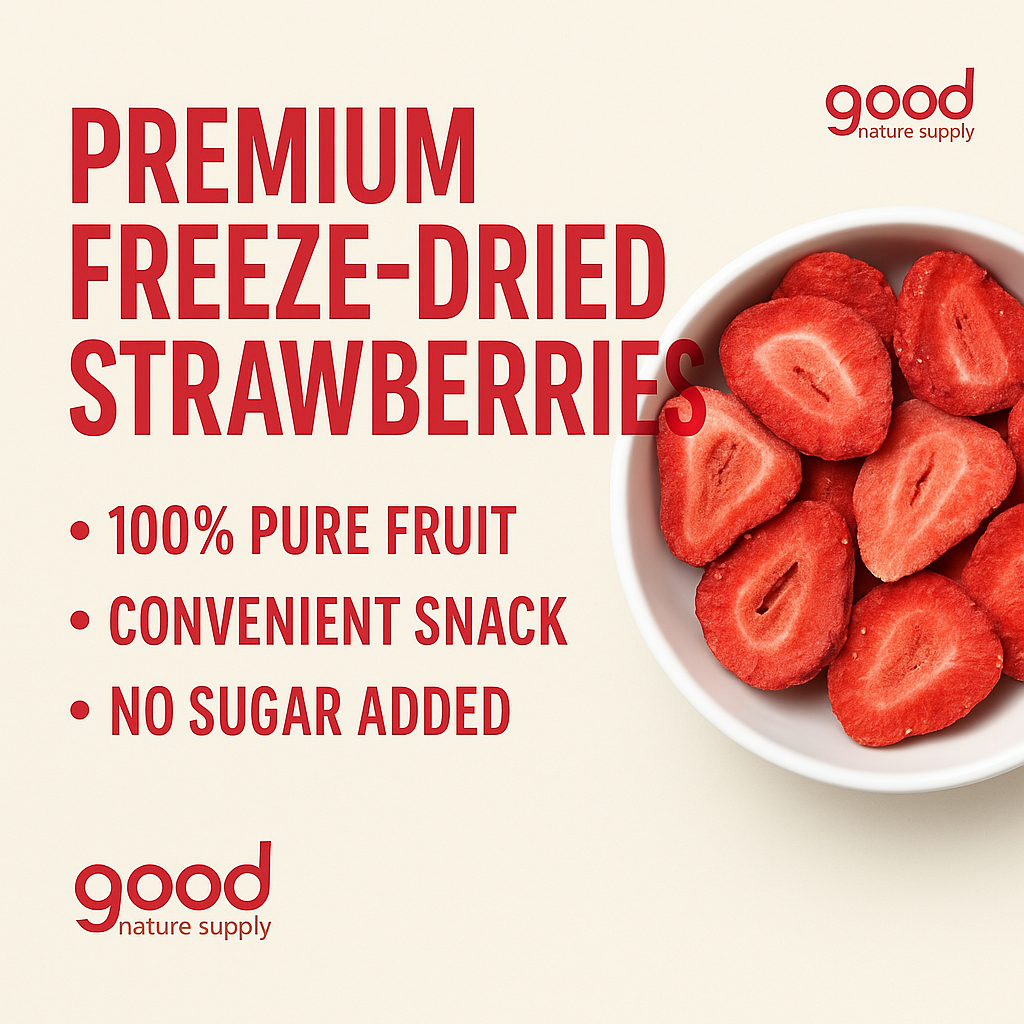 A marketing image for Good Nature Supply Premium Freeze-Dried Strawberries. The text in red reads: "PREMIUM FREEZE-DRIED STRAWBERRIES" followed by three bullet points: "100% PURE FRUIT," "CONVENIENT SNACK," and "NO SUGAR ADDED." A white bowl filled with slices of whole, red freeze-dried strawberries is featured on the right. The "good nature supply" logo is at the top right and bottom left.